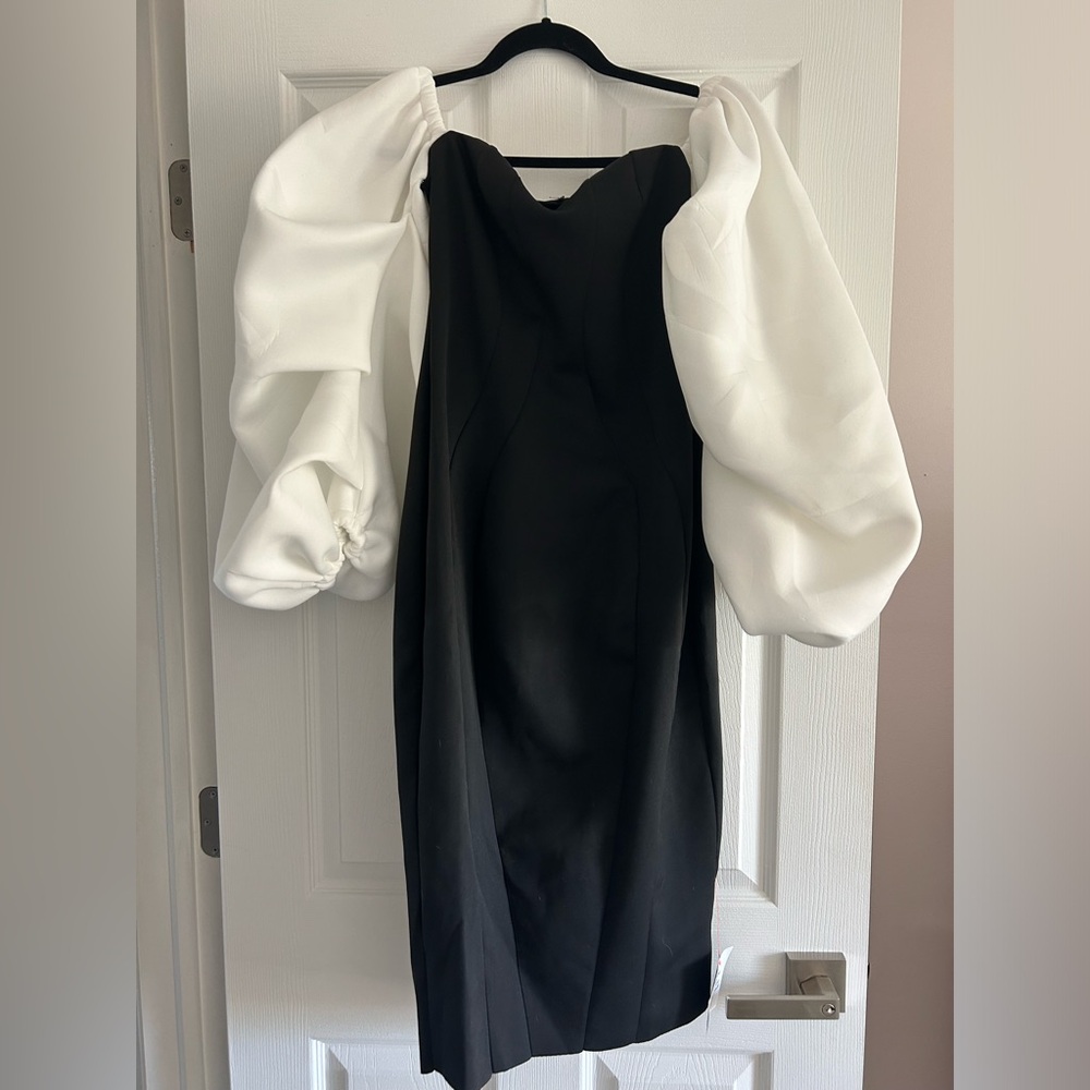 Fun, sexy, black body con midi puff sleeve dress! NEVER WORN NEW WITH TAGS